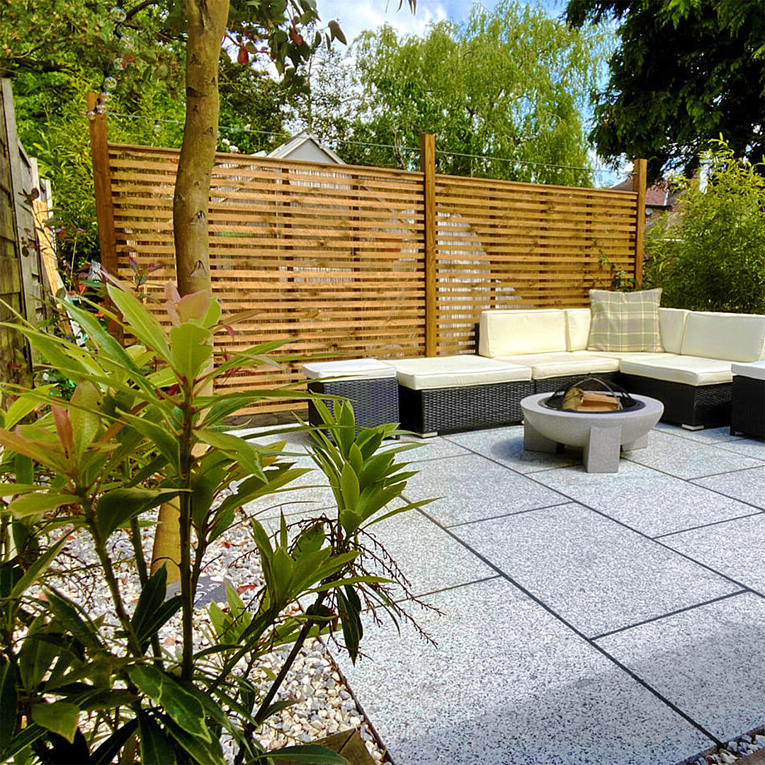 Grey textured slab area in a garden
