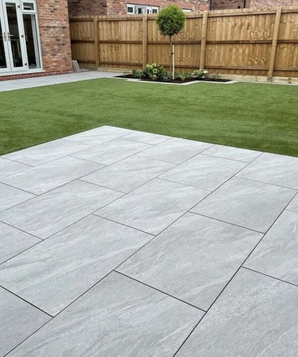 County Light Grey porcelain slabs in a garden