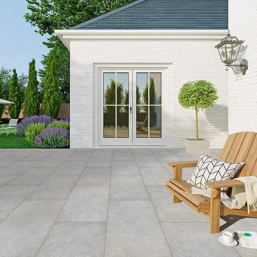 Quartz Grey slabs in a garden, making a patio