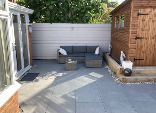Avenida Gris paving in a garden