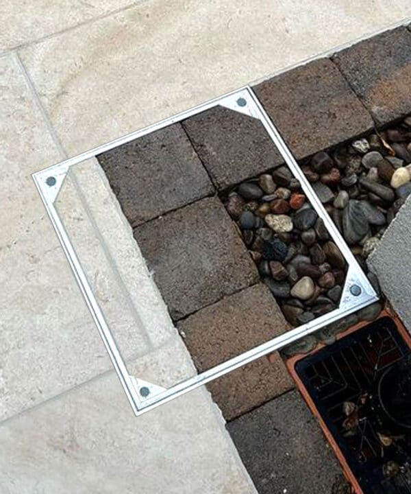 Alusthetic double sealed manhole cover installed outdoors