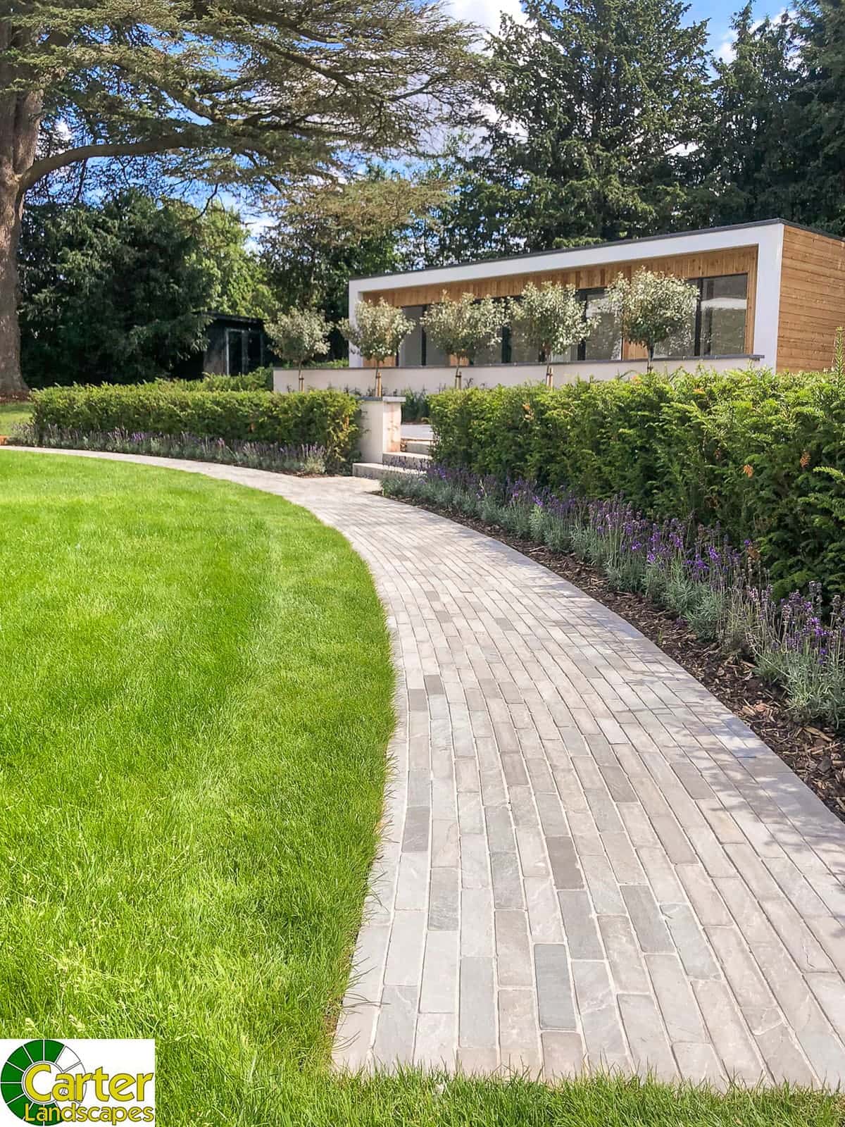 Kandla Grey Setts on a pathway in a garden