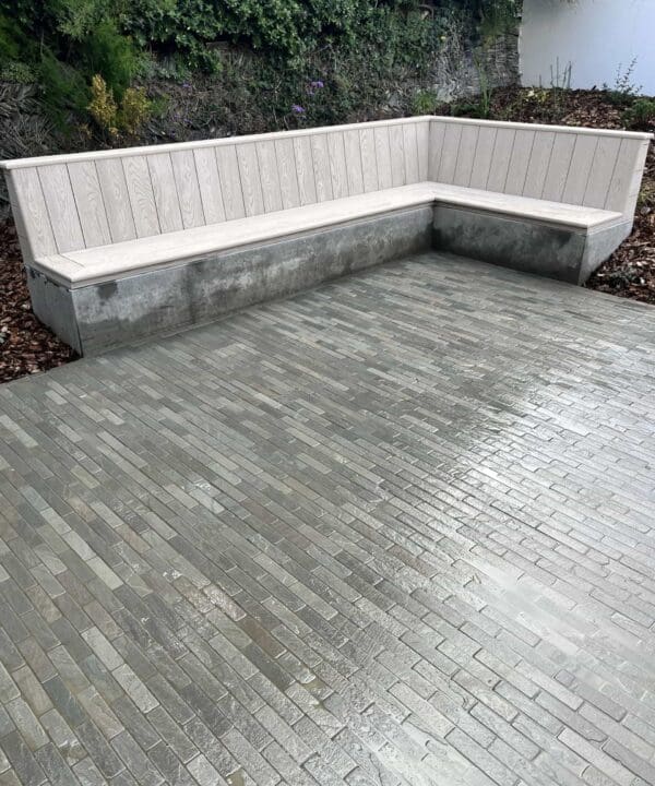 Kandla Grey Setts on a patio in a garden