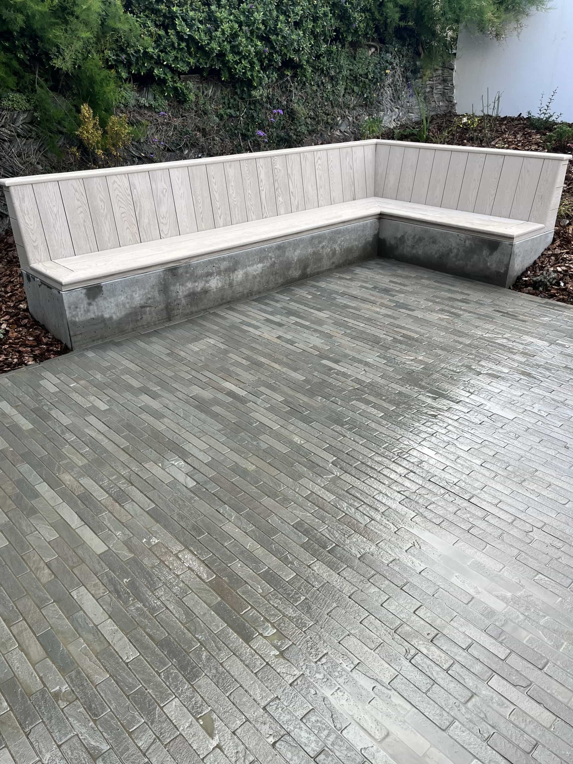 Kandla Grey Setts on a patio in a garden
