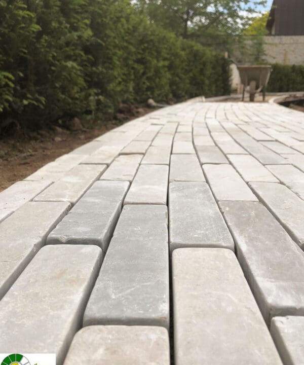 Kandla Grey Setts being laid on a pathway