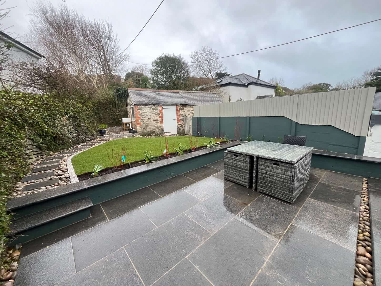 Dark Grey Granite slabs in a garden