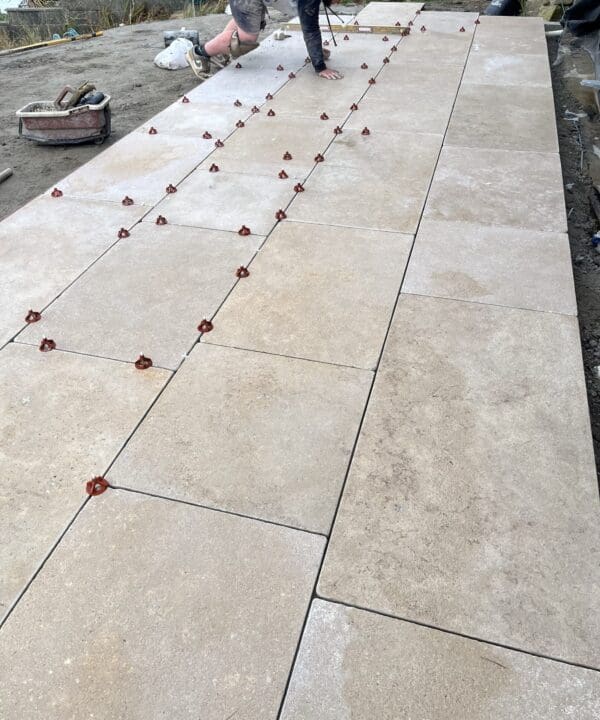 Millbrook Pearl Limestone being laid in a garden