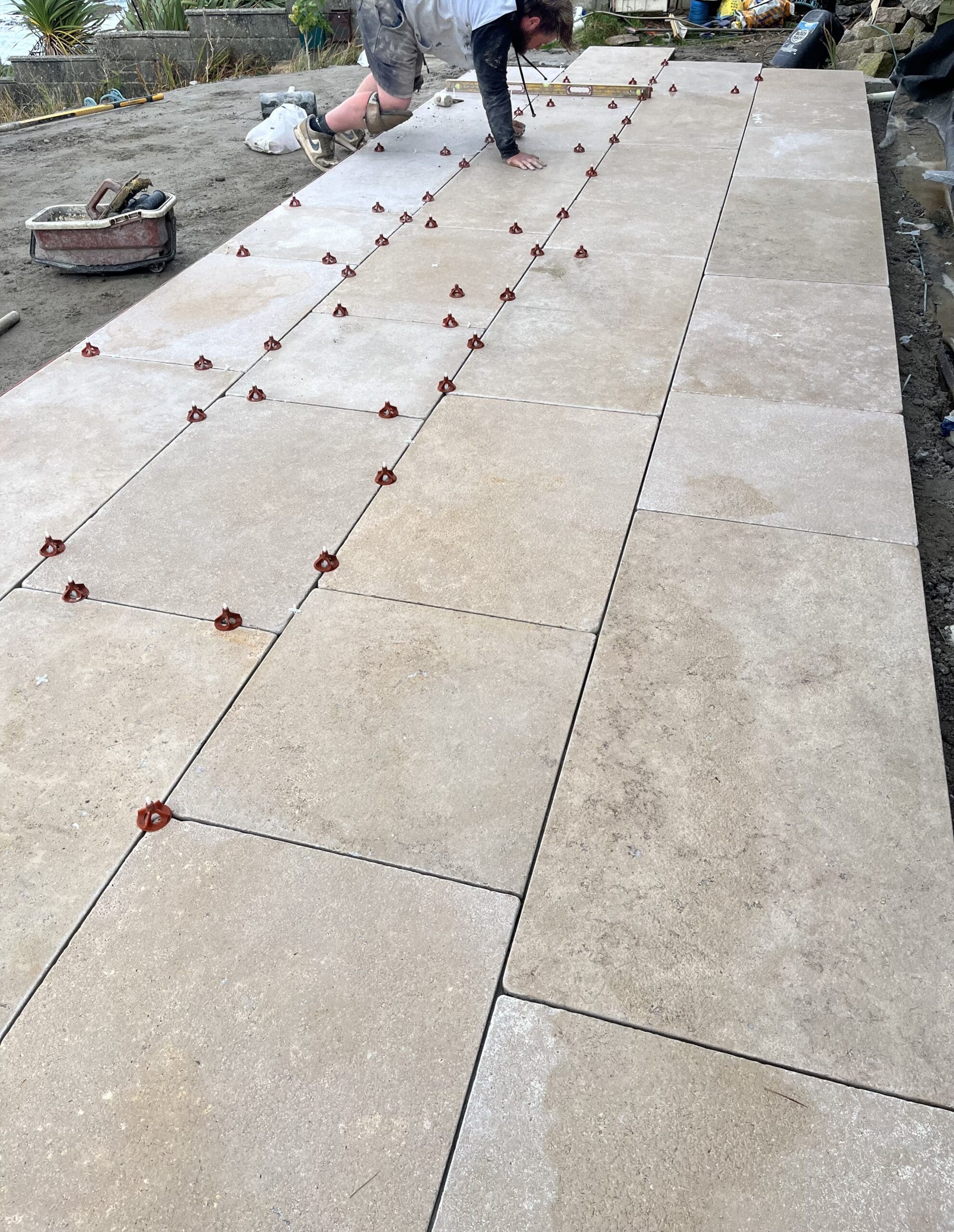 Millbrook Pearl Limestone being laid in a garden
