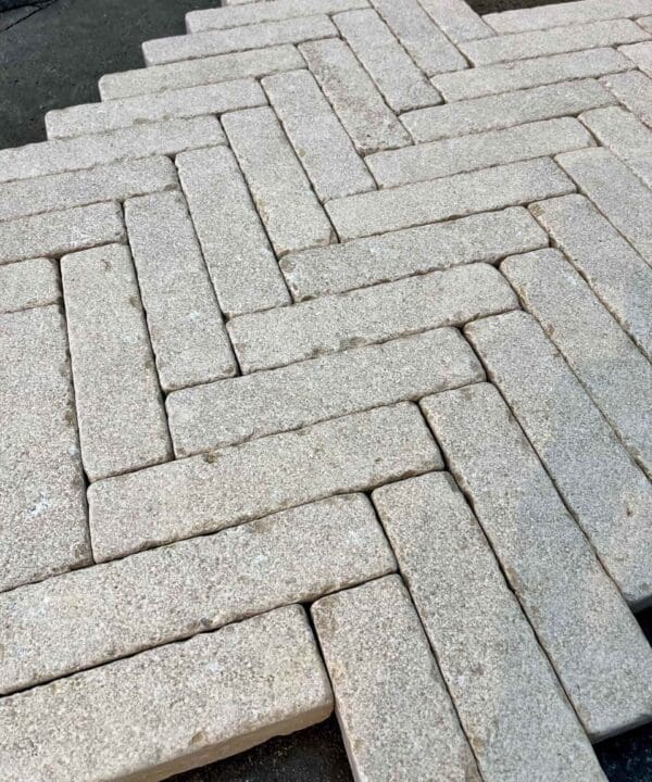 Millbrook Pearl Dual-Face Limestone Setts laid out in a pattern