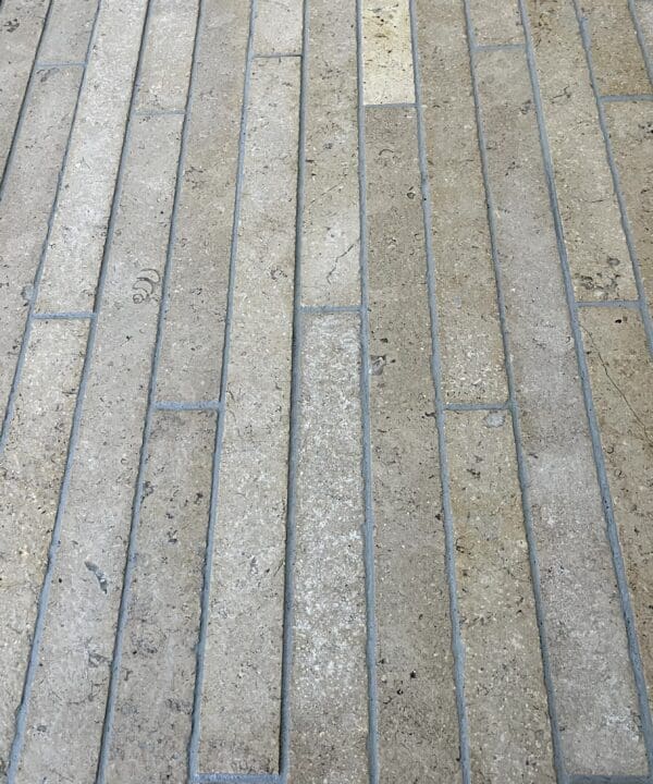 Millbrook Pearl Linear Limestone set in place